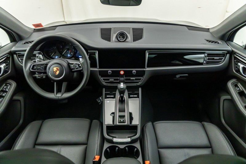 2024 Porsche Macan  in a Volcano Grey Metallic exterior color and Blackinterior. Lotus Manhattan 347-395-5714 lotusmanhattan.com 