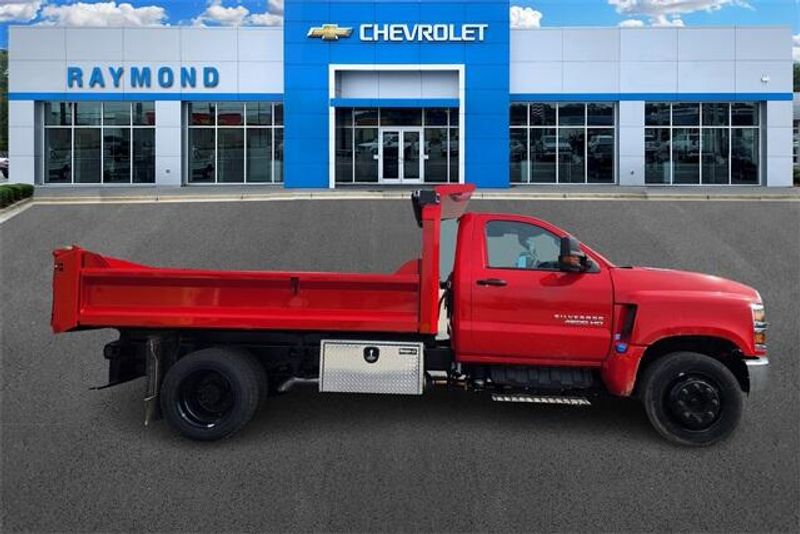 2023 Chevrolet Silverado 4500HD Work Truck in a Red exterior color and Dark Ash Seats With Jet Black Interior Accentsinterior. Raymond Auto Group 888-703-9950 raymonddeals.com 