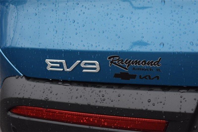 2024 Kia EV9 Wind in a Ocean exterior color and Lt Gry Syntex Lth Seatsinterior. Raymond Auto Group 888-703-9950 raymonddeals.com 