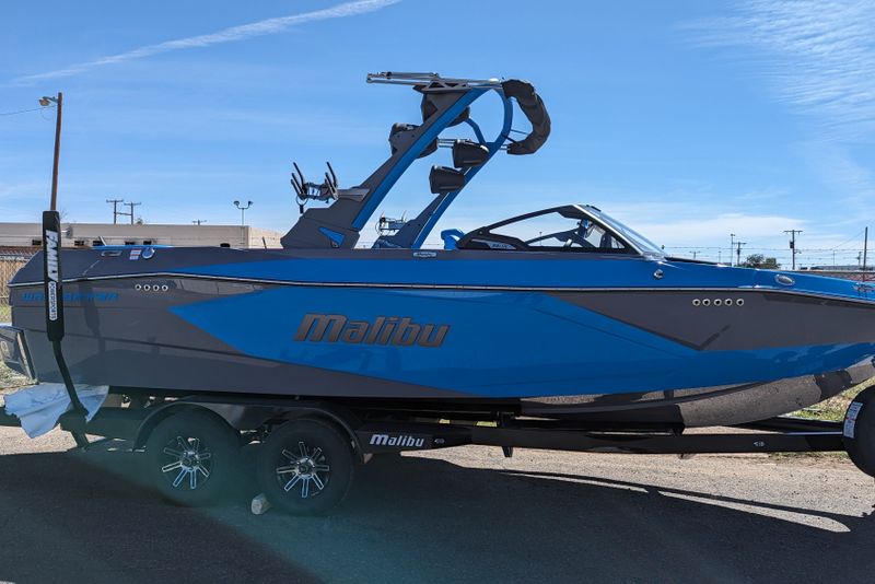 2024 MALIBU MB4932BOAT  in a BLUE exterior color and EBONY AND COOL VAPOR BLUEinterior. Family PowerSports (877) 886-1997 familypowersports.com 