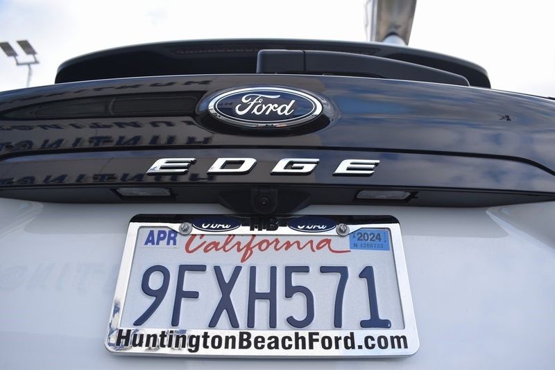 2023 Ford Edge SEL in a Oxford White exterior color and Ebonyinterior. BEACH BLVD OF CARS beachblvdofcars.com 
