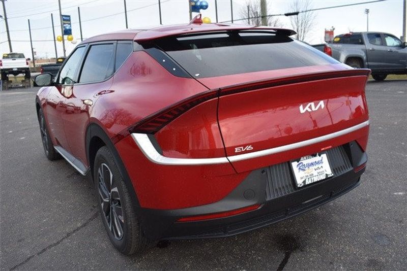 2024 Kia EV6 Light in a Red exterior color and Blk Recycled Fabric &Vegainterior. Raymond Auto Group 888-703-9950 raymonddeals.com 