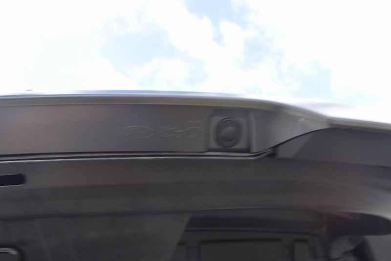 2023 Ford F-150 Lightning Lariat in a Carbonized Gray Metallic exterior color and Blackinterior. BEACH BLVD OF CARS beachblvdofcars.com 