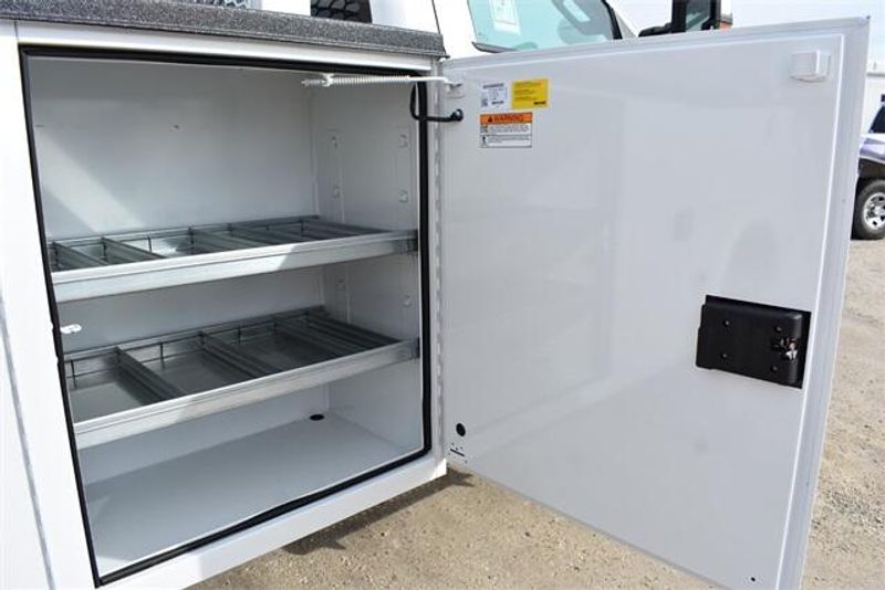 2023 Chevrolet Silverado 5500HD Work Truck in a Summit White exterior color and Dark Ash Seats With Jet Black Interior Accentsinterior. Raymond Auto Group 888-703-9950 raymonddeals.com 