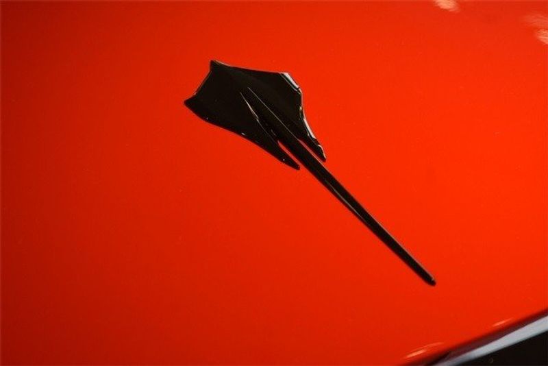 2024 Chevrolet Corvette Stingray in a Torch Red exterior color and Jet Blackinterior. Raymond Auto Group 888-703-9950 raymonddeals.com 