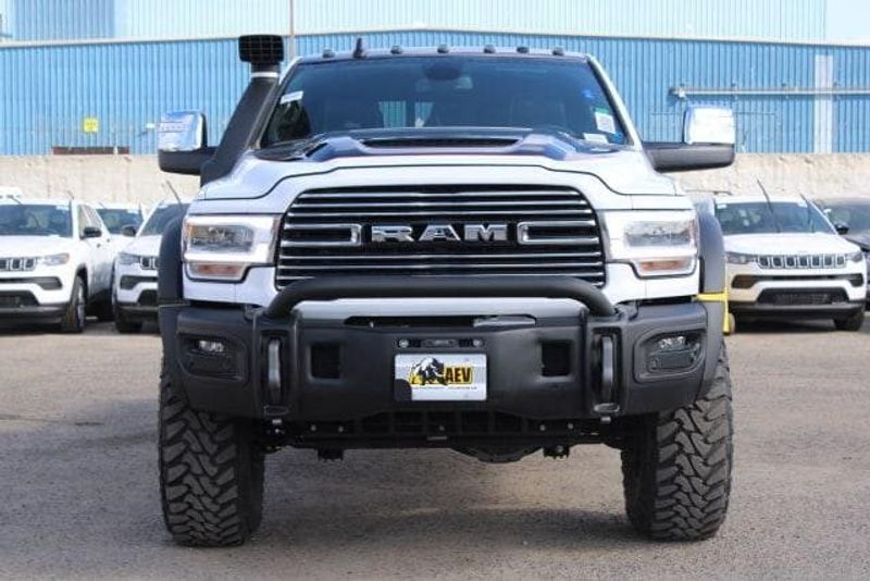 2023 RAM 2500 Laramie Crew Cab 4x4 in a Bright White exterior color and Blackinterior. BEACH BLVD OF CARS beachblvdofcars.com 