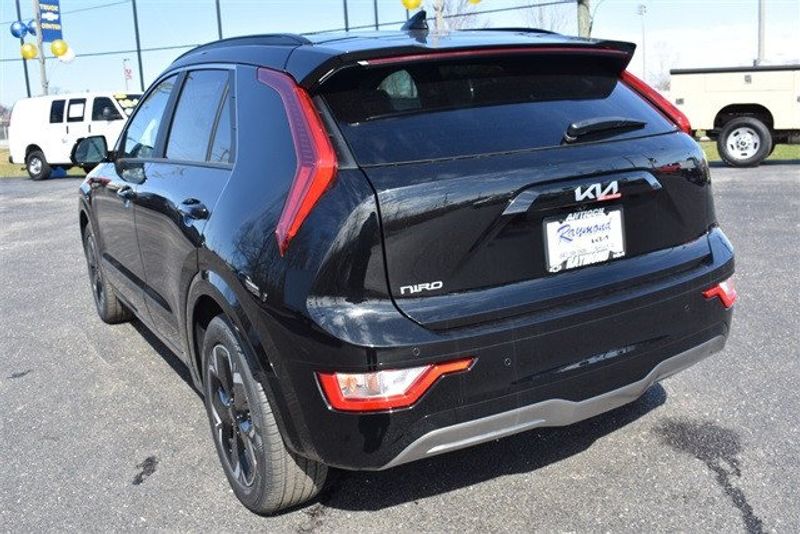 2024 Kia Niro EV Wind in a Aurora Black exterior color and Charcoalinterior. Raymond Auto Group 888-703-9950 raymonddeals.com 