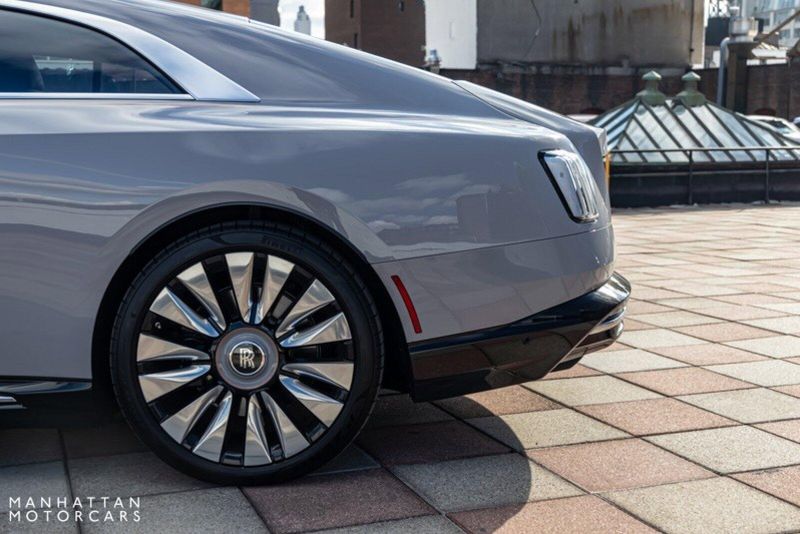 2024 Rolls-Royce Spectre  in a Tempest Grey exterior color and Black with Mandarin Accentsinterior. Lotus Manhattan 347-395-5714 lotusmanhattan.com 