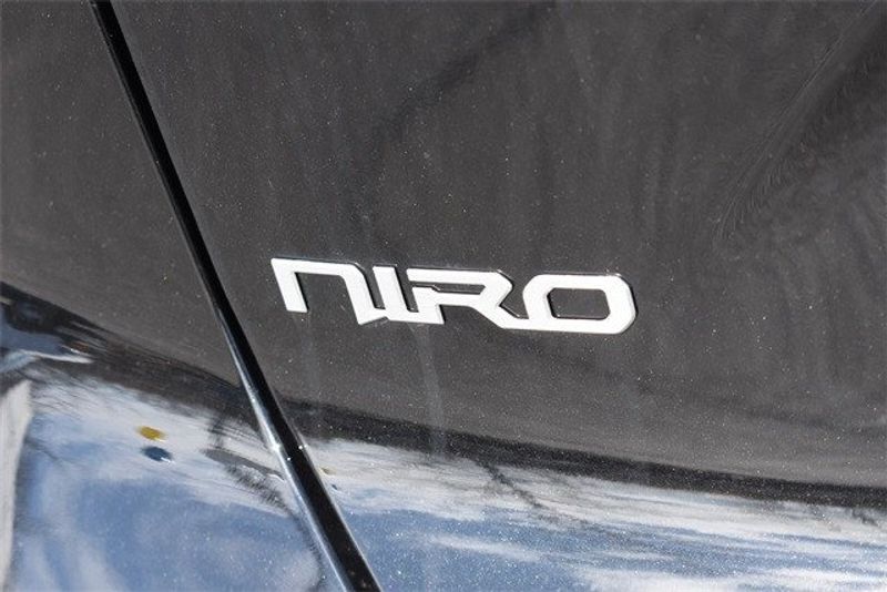 2024 Kia Niro EV Wind in a Aurora Black exterior color and Charcoalinterior. Raymond Auto Group 888-703-9950 raymonddeals.com 