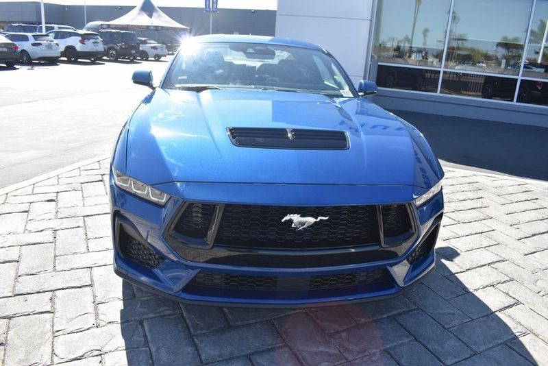 2024 Ford Mustang GT Premium in a Atlas Blue Metallic exterior color and Black Onyxinterior. BEACH BLVD OF CARS beachblvdofcars.com 