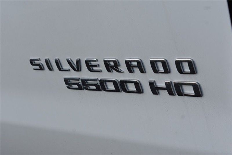 2023 Chevrolet Silverado 4500HD Work Truck in a Summit White exterior color and Dark Ash Seats With Jet Black Interior Accentsinterior. Raymond Auto Group 888-703-9950 raymonddeals.com 
