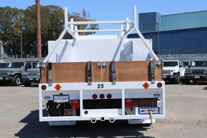 2022 RAM 5500 Chassis Tradesman Regular Cab & 4x2 in a White exterior color and Diesel Gray/Blackinterior. BEACH BLVD OF CARS beachblvdofcars.com 