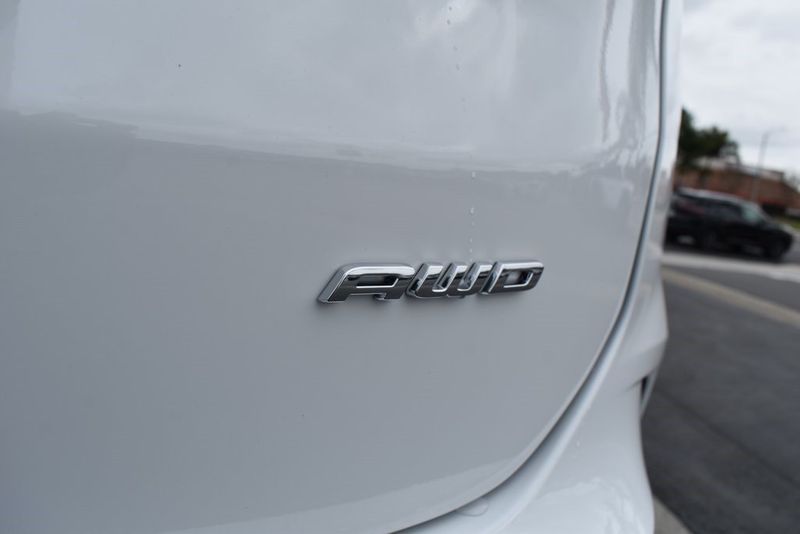 2024 Ford Edge SE in a Oxford White exterior color and Ebonyinterior. BEACH BLVD OF CARS beachblvdofcars.com 