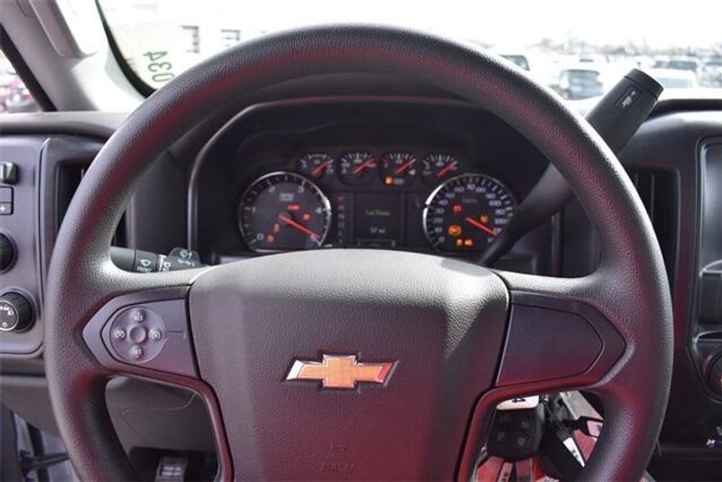 2023 Chevrolet Silverado 5500HD Work Truck in a Summit White exterior color and Dark Ash Seats With Jet Black Interior Accentsinterior. Raymond Auto Group 888-703-9950 raymonddeals.com 