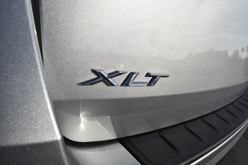 2023 Ford Explorer XLT in a Iconic Silver Metallic exterior color and Ebonyinterior. BEACH BLVD OF CARS beachblvdofcars.com 