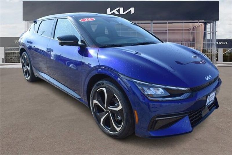 2024 Kia EV6 GT-Line in a Yacht Blue exterior color and Blackinterior. Raymond Auto Group 888-703-9950 raymonddeals.com 