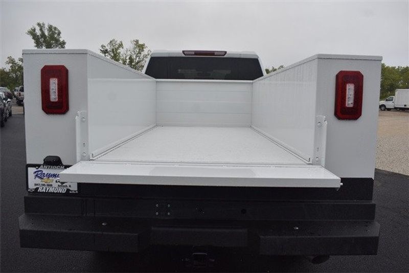 2023 Chevrolet Silverado 2500HD Work Truck in a Summit White exterior color and Blackinterior. Raymond Auto Group 888-703-9950 raymonddeals.com 