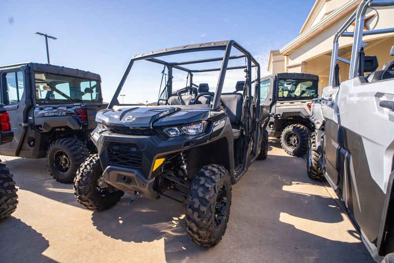2024 CAN-AM DEFENDER MAX DPS HD9 TIMELESS BLACK in a BLACK exterior color. Family PowerSports (877) 886-1997 familypowersports.com 