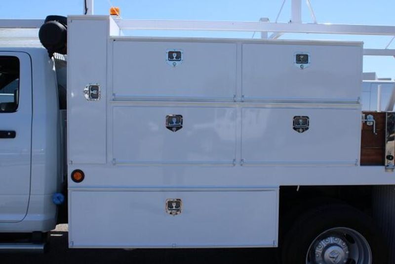2022 RAM 5500 Chassis Tradesman Regular Cab & 4x2 in a White exterior color and Diesel Gray/Blackinterior. BEACH BLVD OF CARS beachblvdofcars.com 