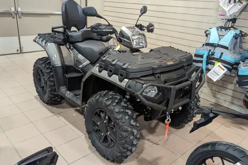 2024 POLARIS SPORTSMAN TOURING XP 1000 TRAIL HEAVY METAL in a HEAVY METAL exterior color. Family PowerSports (877) 886-1997 familypowersports.com 