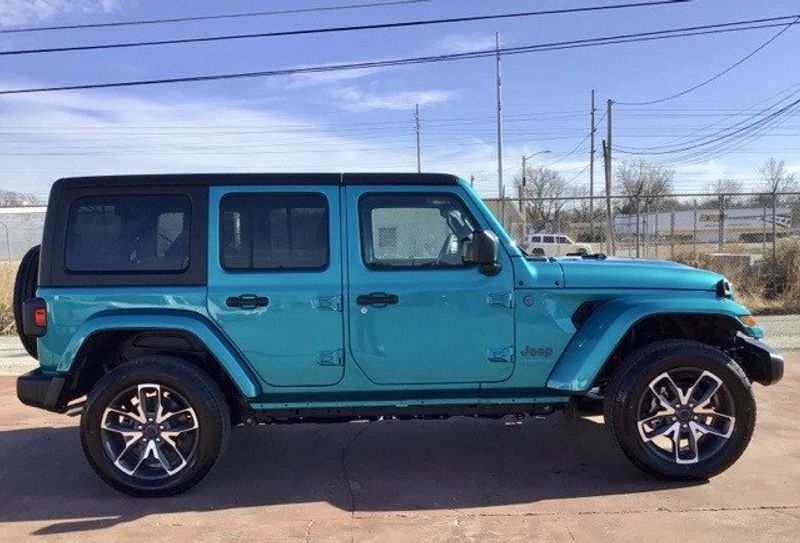 2024 Jeep Wrangler 4-door Sport S 4xe in a Bikini Pearl Coat exterior color and Blackinterior. Matthews Chrysler Dodge Jeep Ram 918-276-8729 cyclespecialties.com 