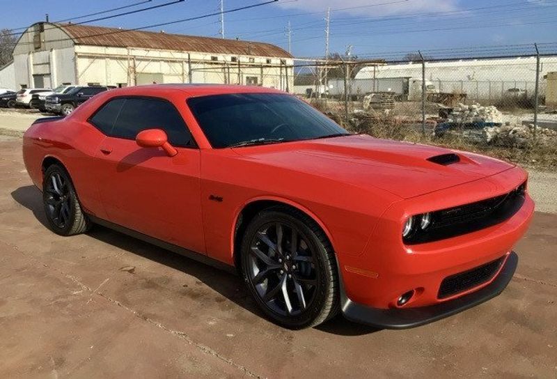 2023 Dodge Challenger R/T in a TorRed exterior color. Matthews Chrysler Dodge Jeep Ram 918-276-8729 cyclespecialties.com 