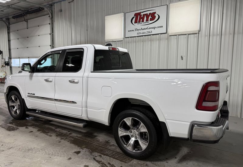 Used 2020 RAM 1500 Laramie in a Bright White Clear Coat exterior color and Blackinterior. Thys Motor Company 319-318-6640 thysmotorco.com 