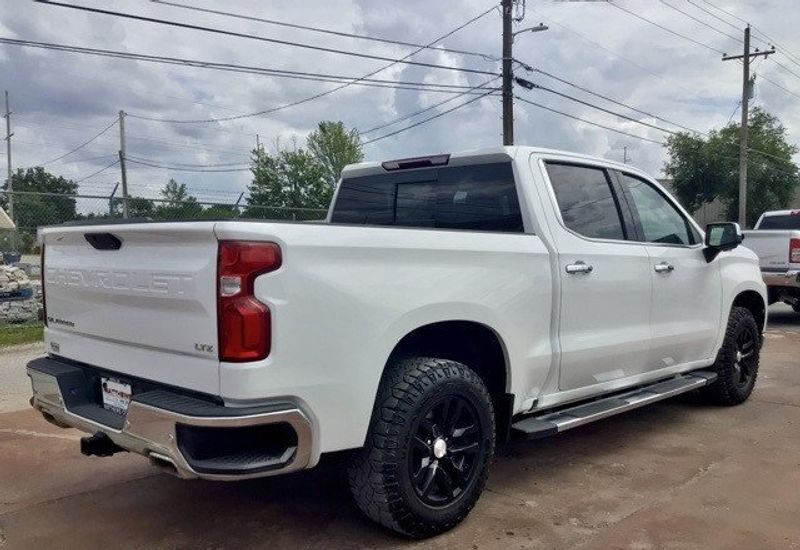 2022 Chevrolet Silverado 1500 LTD LTZ in a Summit White exterior color and Jet Blackinterior. Matthews Chrysler Dodge Jeep Ram 918-276-8729 cyclespecialties.com 