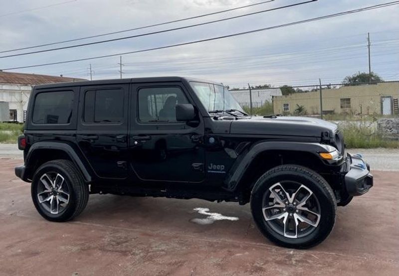 2024 Jeep Wrangler 4-door Sport S 4xe in a Black Clear Coat exterior color and Blackinterior. Matthews Chrysler Dodge Jeep Ram 918-276-8729 cyclespecialties.com 