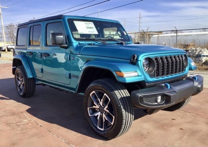 2024 Jeep Wrangler 4-door Sport S 4xe in a Bikini Pearl Coat exterior color and Blackinterior. Matthews Chrysler Dodge Jeep Ram 918-276-8729 cyclespecialties.com 