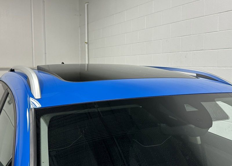 2023 Volkswagen Taos SE AWD w/Sunroof in a Cornflower Blue exterior color and Black Heated Seatsinterior. Schmelz Countryside SAAB (888) 558-1064 stpaulsaab.com 