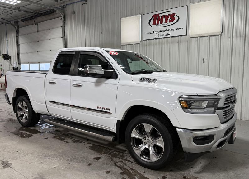 Used 2020 RAM 1500 Laramie in a Bright White Clear Coat exterior color and Blackinterior. Thys Motor Company 319-318-6640 thysmotorco.com 