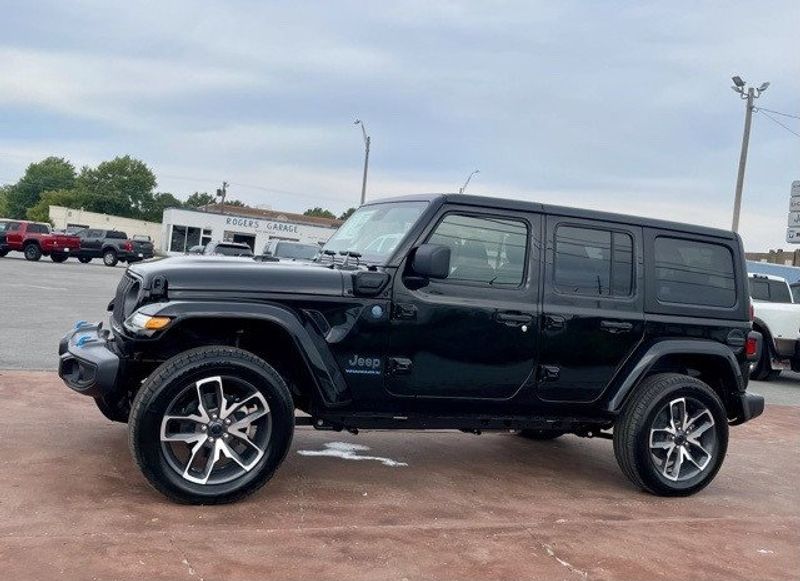 2024 Jeep Wrangler 4-door Sport S 4xe in a Black Clear Coat exterior color and Blackinterior. Matthews Chrysler Dodge Jeep Ram 918-276-8729 cyclespecialties.com 