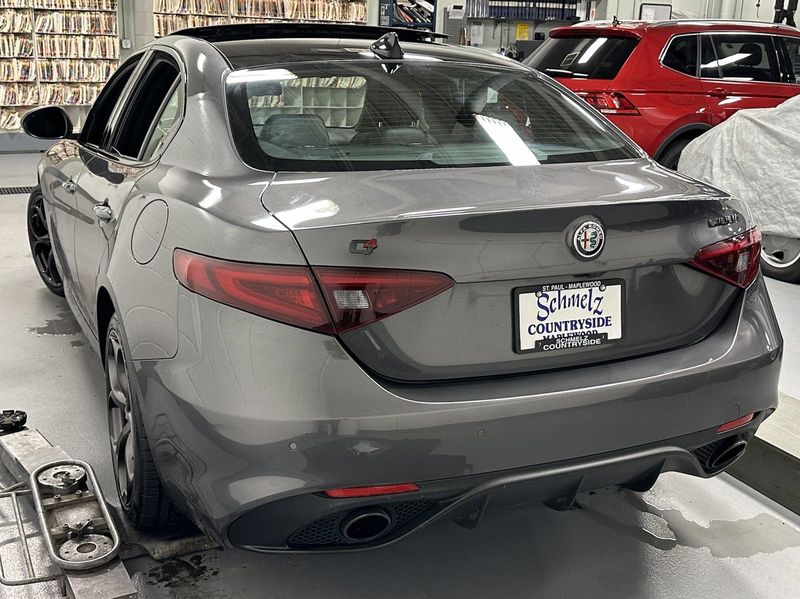 2021 Alfa Romeo Giulia Ti Sport Nero AWD w/Sunroof & Nav in a Vesuvio Gray Metallic exterior color and Black Heated Sport Leatherinterior. Schmelz Countryside SAAB (888) 558-1064 stpaulsaab.com 