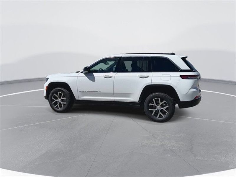 2024 Jeep Grand Cherokee Limited 4x4 in a Bright White Clear Coat exterior color. McPeek