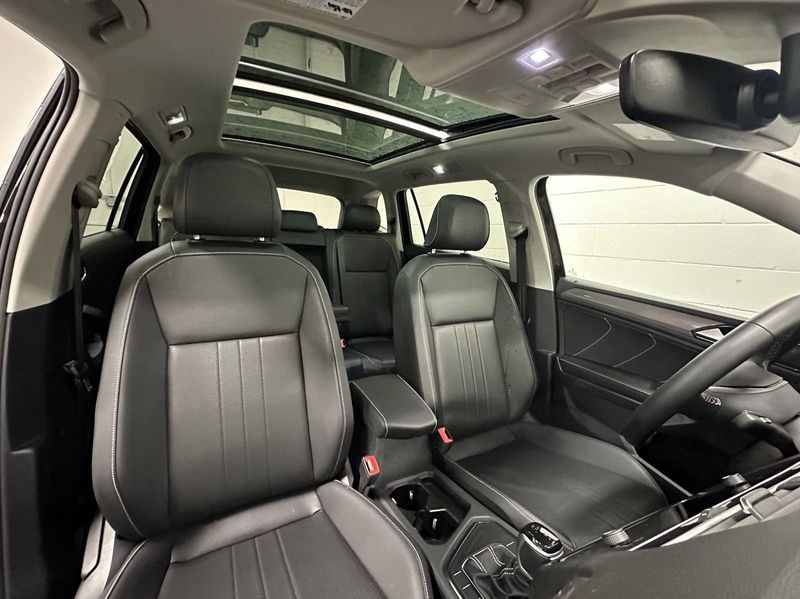2023 Volkswagen Tiguan SE w/Sunroof & 3rd Row in a Deep Black Pearl exterior color and Black Heated Seatsinterior. Schmelz Countryside SAAB (888) 558-1064 stpaulsaab.com 