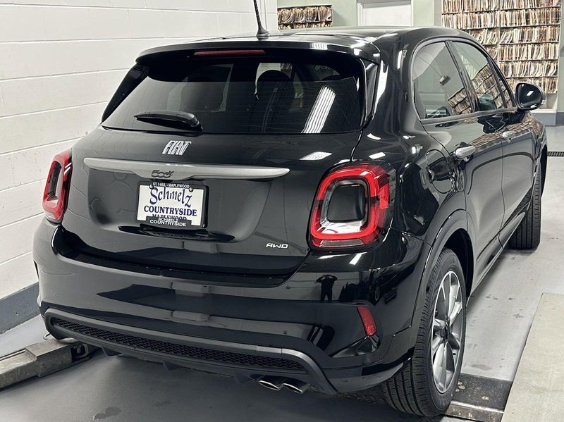 2022 Fiat 500X Sport AWD w/Sunroof in a Nero Cinema (Black Clear Coat) exterior color and Black Heated Seatsinterior. Schmelz Countryside SAAB (888) 558-1064 stpaulsaab.com 