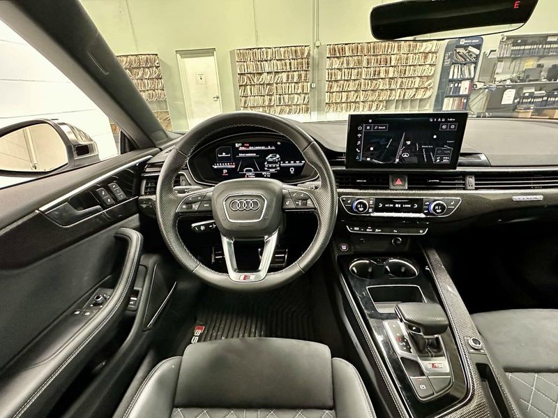 2022 Audi S5 Coupe Premium Plus AWD w/Nav in a Glacier White Metallic exterior color and Black Heated Leatherinterior. Schmelz Countryside Alfa Romeo (651) 867-3222 schmelzalfaromeo.com 