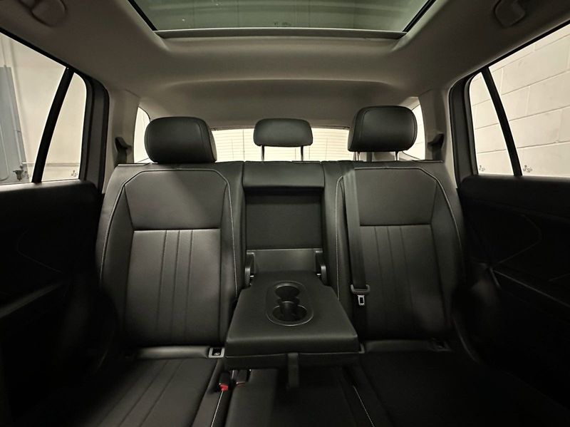2023 Volkswagen Tiguan SE w/Sunroof & 3rd Row in a Pyrite Silver Metallic exterior color and Black Heated Seatsinterior. Schmelz Countryside Alfa Romeo and Fiat (651) 968-0556 schmelzfiat.com 