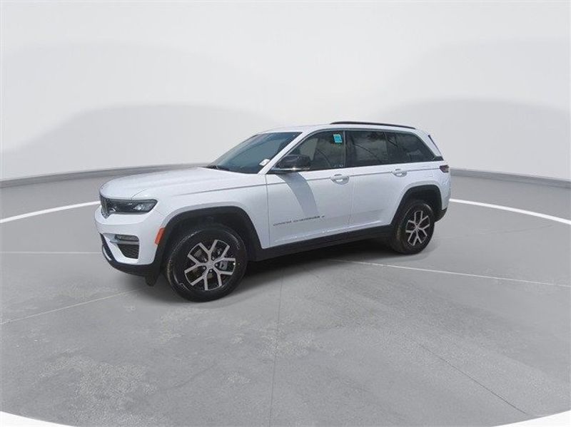 2024 Jeep Grand Cherokee Limited 4x4 in a Bright White Clear Coat exterior color. McPeek