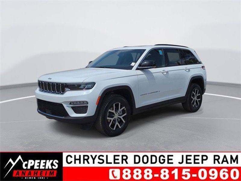 2024 Jeep Grand Cherokee Limited 4x4 in a Bright White Clear Coat exterior color. McPeek