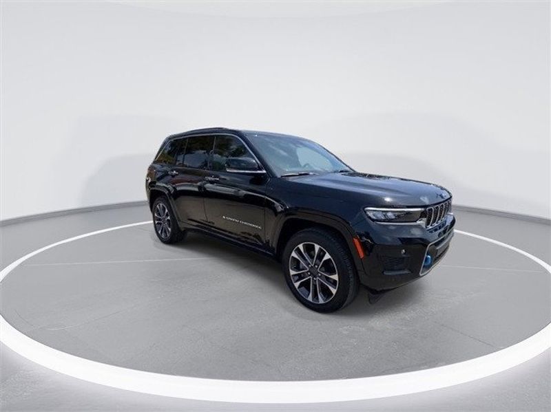 2023 Jeep Grand Cherokee Overland 4xe in a Diamond Black Crystal Pearl Coat exterior color and Global Blackinterior. McPeek