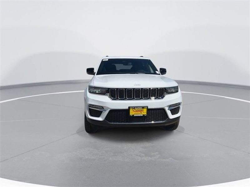 2024 Jeep Grand Cherokee Limited 4x4 in a Bright White Clear Coat exterior color. McPeek