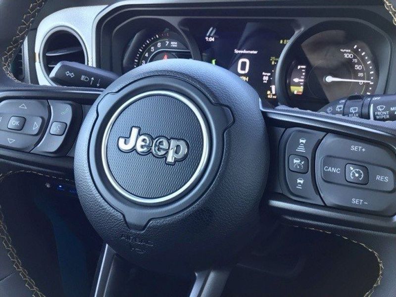 2024 Jeep Wrangler 4-door Sport S 4xe in a Bikini Pearl Coat exterior color and Blackinterior. Matthews Chrysler Dodge Jeep Ram 918-276-8729 cyclespecialties.com 