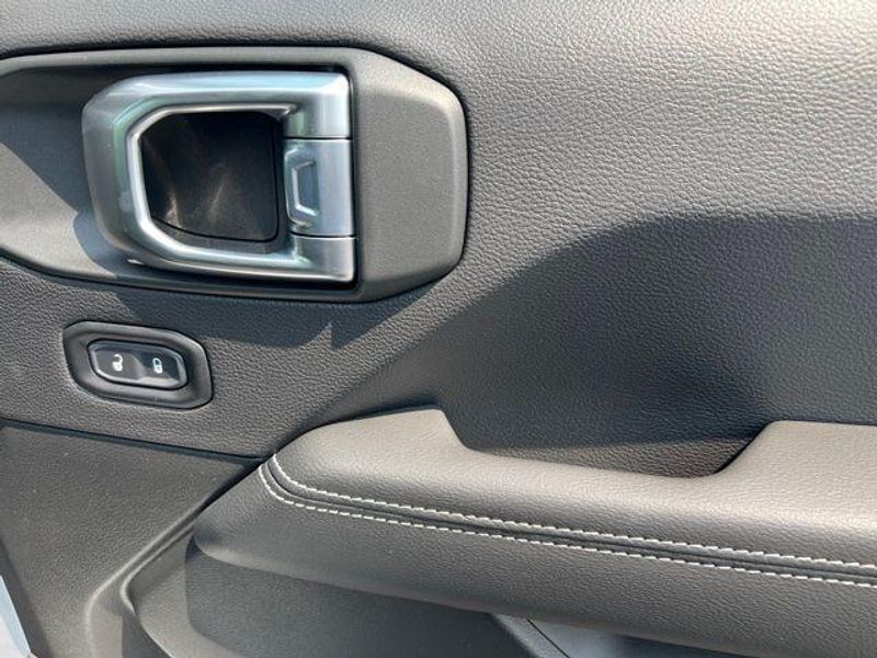 2023 Jeep Wrangler Sahara 4xe in a Silver Zynith Clear Coat exterior color and Blackinterior. Lakeshore CDJR Seaford 302-213-6058 lakeshorecdjr.com 