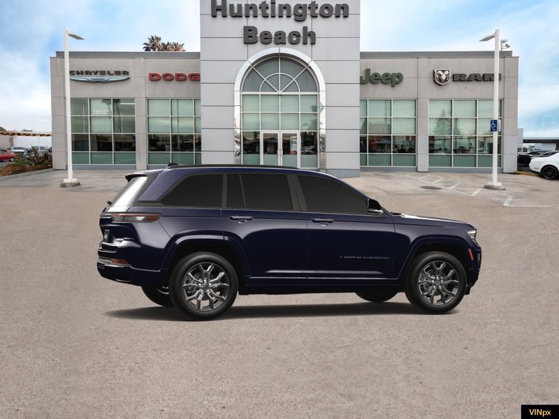 2023 Jeep Grand Cherokee 4xe Base 30th Anniversary 4x4 in a Midnight Sky exterior color and Global Blackinterior. BEACH BLVD OF CARS beachblvdofcars.com 