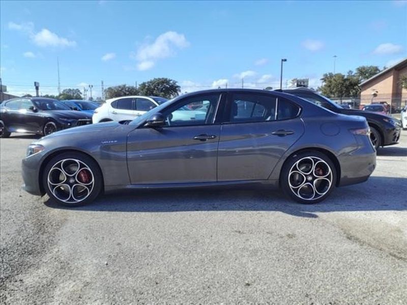 2024 Alfa Romeo Giulia Veloce in a Vesuvio Gray Metallic exterior color and Blackinterior. Northside Imports Houston 281-475-4549 northsideimportshouston.com 