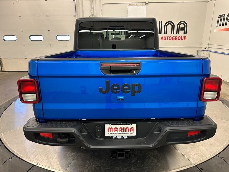 2023 Jeep Gladiator Sport S 4x4 in a Hydro Blue Pearl Coat exterior color and Blackinterior. Marina Chrysler Dodge Jeep RAM (855) 616-8084 marinadodgeny.com 