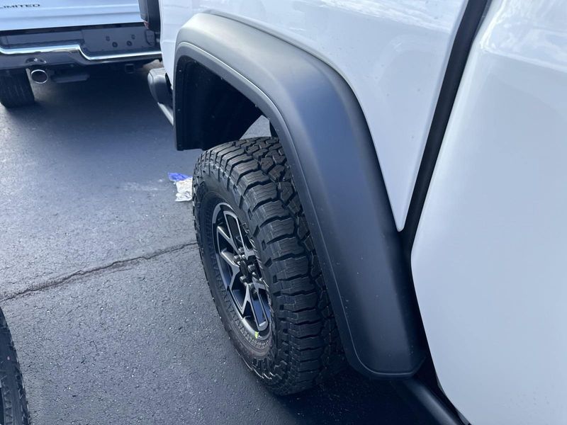 2024 Jeep Gladiator Rubicon 4x4 in a Bright White Clear Coat exterior color. Gupton Motors Inc 615-384-2886 guptonmotors.com 