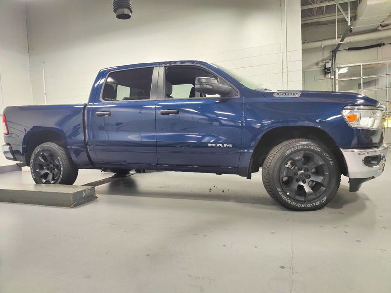 2023 RAM 1500 Big Horn Crew Cab 4x4 w/Heated Seats in a Patriot Blue Pearl Coat exterior color and Diesel Gray/Black Heated Seatsinterior. Schmelz Countryside Alfa Romeo (651) 867-3222 schmelzalfaromeo.com 